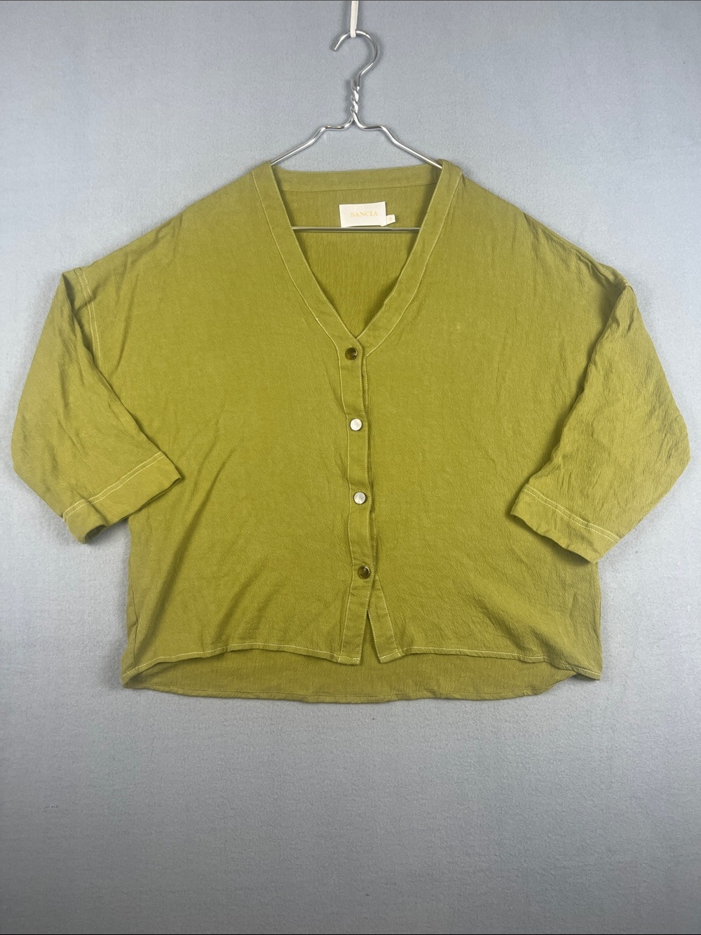 Sancia Relaxed V-Neck Button Front Top - Olive Green
Size: small